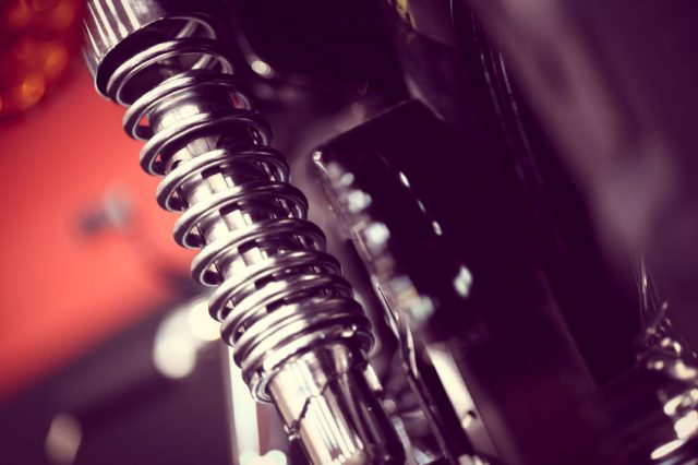 46627583 - color shot of a motorcycle shock absorber.